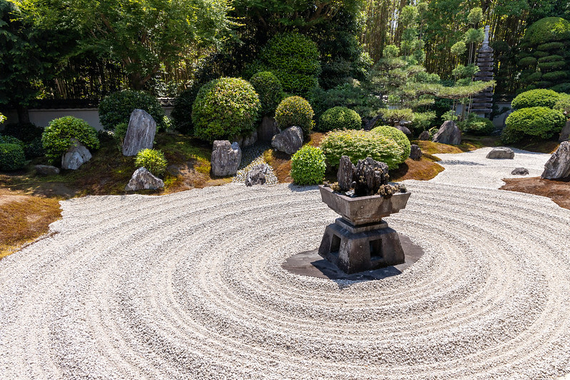 Japanese Zen garden with raked gravel and stones